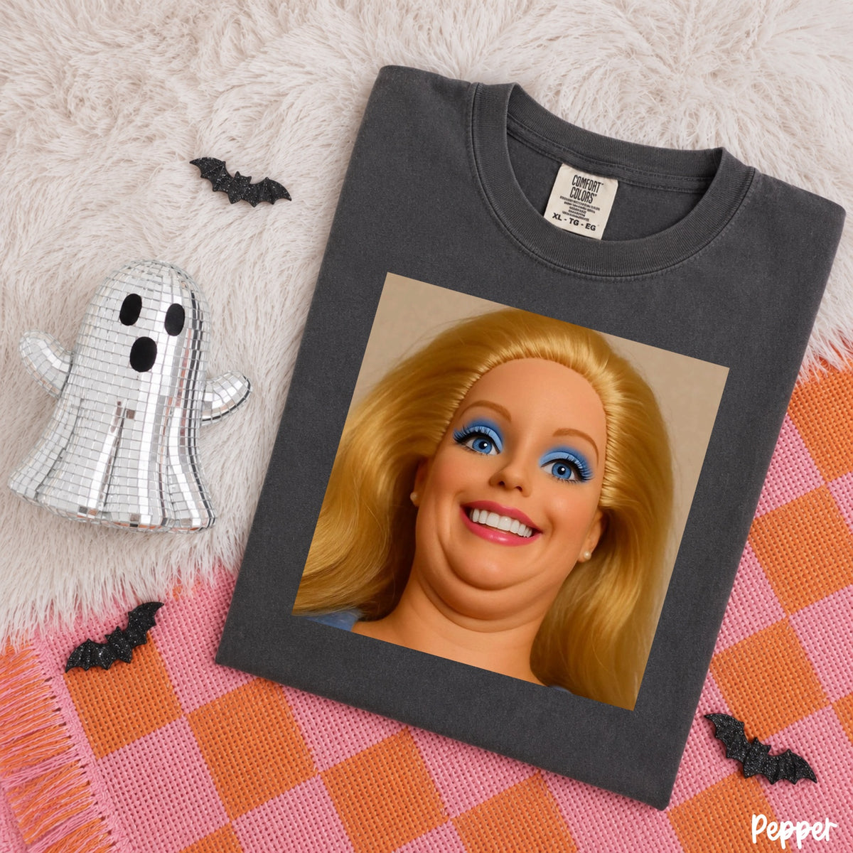 Comfort Colors Pepper T-shirt mockup featuring a humorous blonde doll close-up