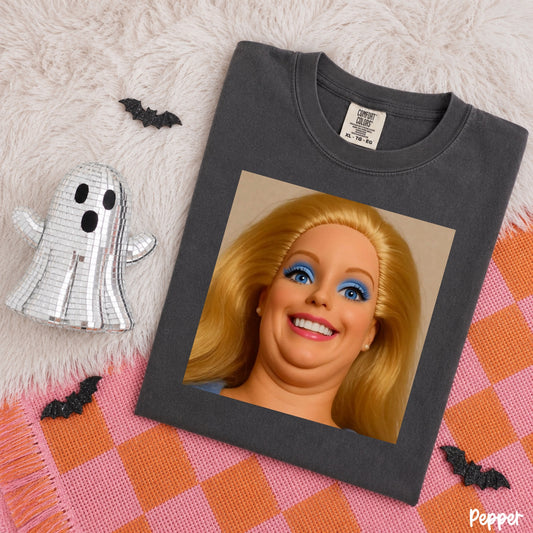 Comfort Colors Pepper T-shirt mockup featuring a humorous blonde doll close-up