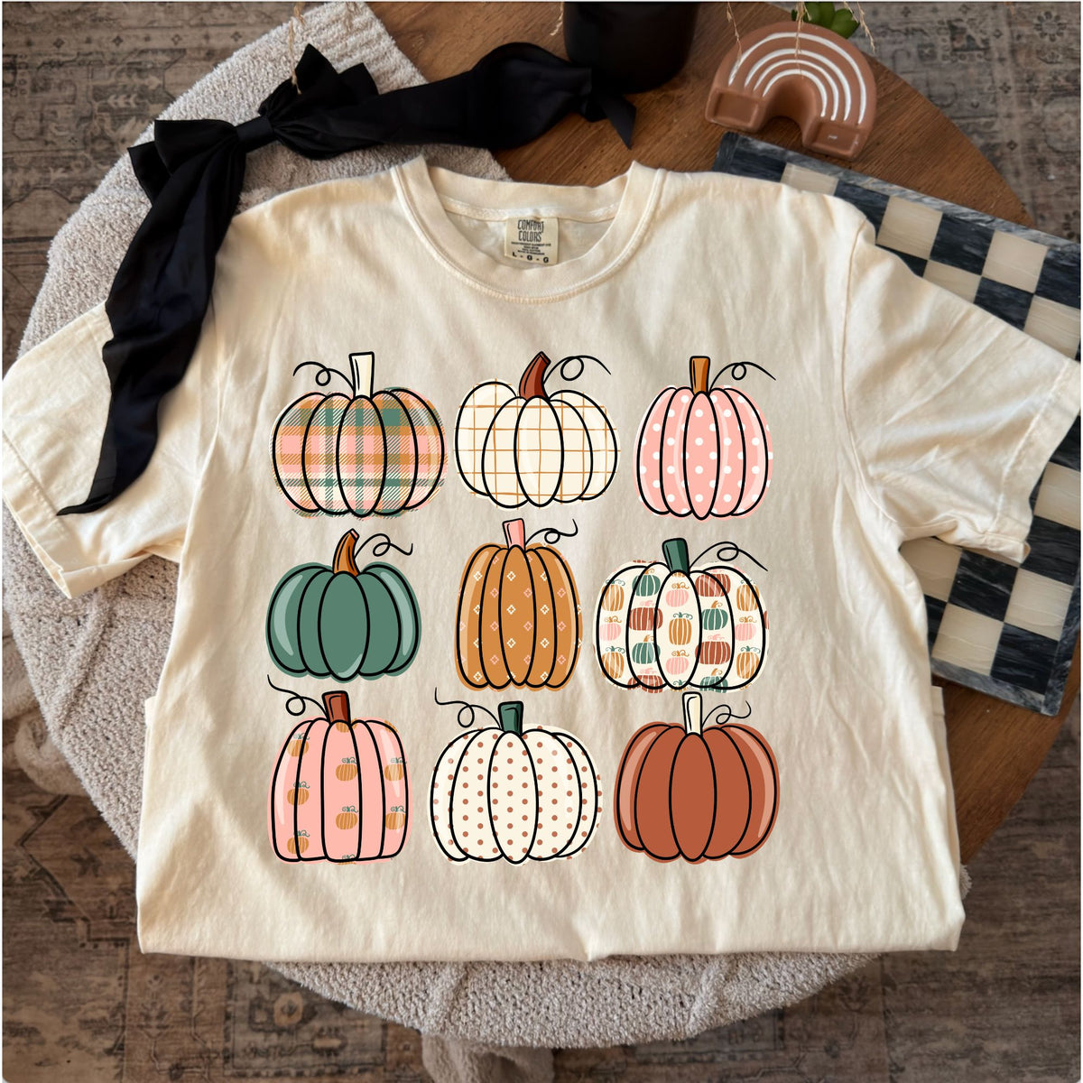 Comfort Colors T-shirt flat lay mockup featuring nine patterned pumpkins design