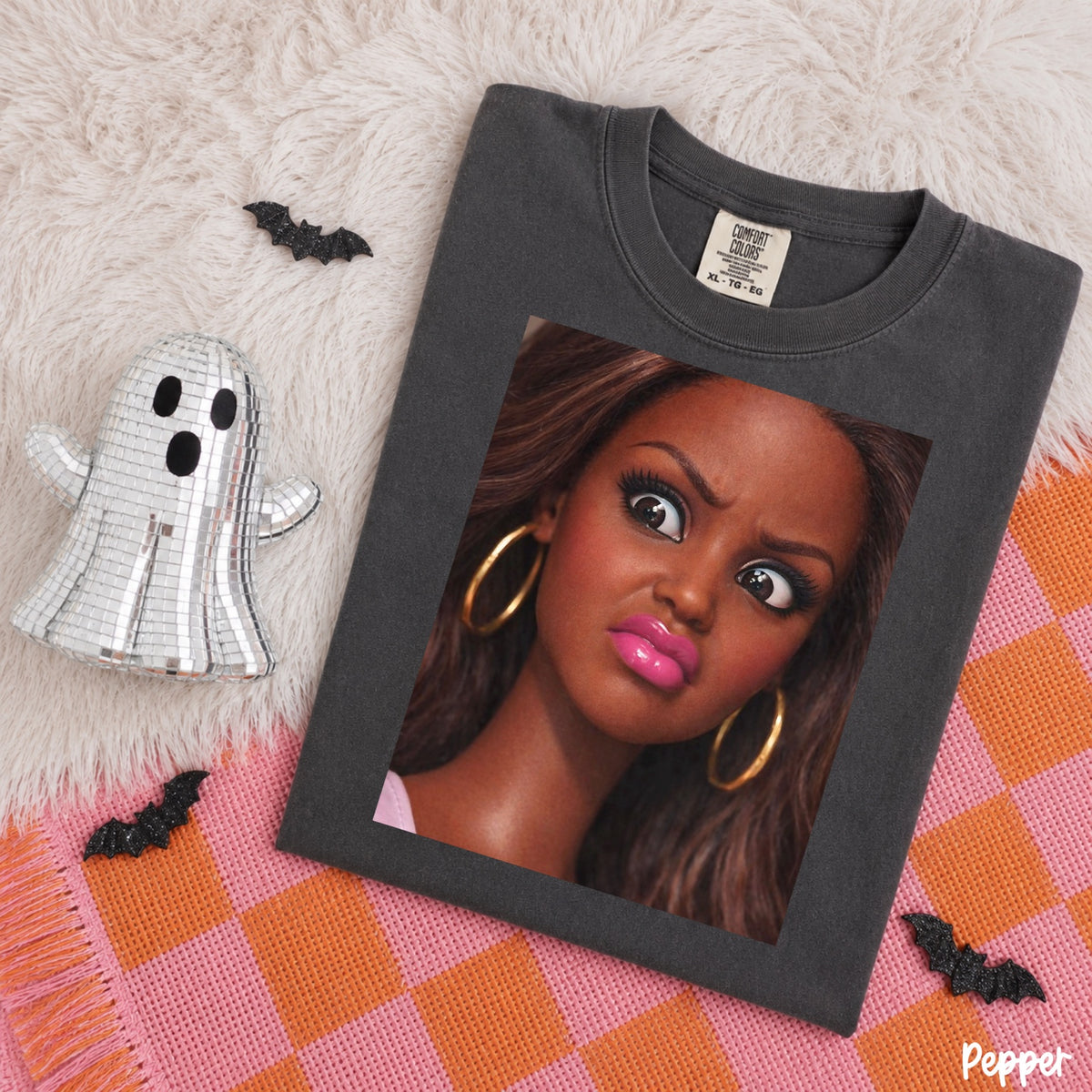 Comfort Colors Pepper T-shirt mockup featuring a dramatic side-eye doll portrait